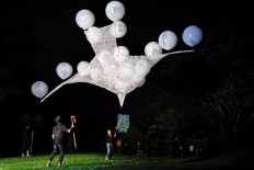 French artists from Remouleurs work with Indonesian puppet artist Herry Dim to present The Bird, a puppet performance at the Gunungan International Mask and Puppets Festival. [JP/Arya Dipa]