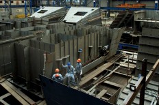 Workers take a break after completing the construction of a module for a 10514 PKR in Surabaya on April 4. JP/Wahyoe Boediwardhana