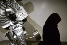 Pintor Sirait presents “Brise”, a complicated maneuver performed at a precise time, with a stainless steel F1 car as a symbol, in ARTJOG 2016.