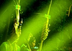 A couple carry two sugarcane effigies symbolizing the groom and his bride in the Cembengan ritual. JP/Ganug Nugroho Adi