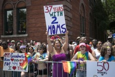 Thousands gather on the North Side of Chicago for the 47th annual Chicago Pride Parade, which kicked off at Montrose and Broadway on Sunday, June 26, 2016. Ashlee Rezin/Chicago Sun-Times via AP