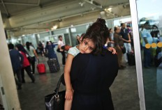 Passengers wait for security checks as they enter Istanbul's Ataturk airport, Wednesday, June 29, 2016. Suicide attackers killed dozens and wounded scores of others at Istanbul's busy Ataturk Airport late Tuesday. AP Photo/Lefteris Pitarakis
