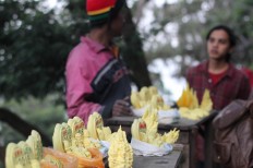 Local people sell souvenirs made from melted sulfur from Ijen crater at the resting post on Mount Ijen on May 5. JP/P J Leo