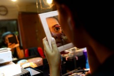 An actress gets ready for the Wayang Orang Bharata performance at the Bharata Purwa building, Jakarta. JP/ Wienda Parwitasari