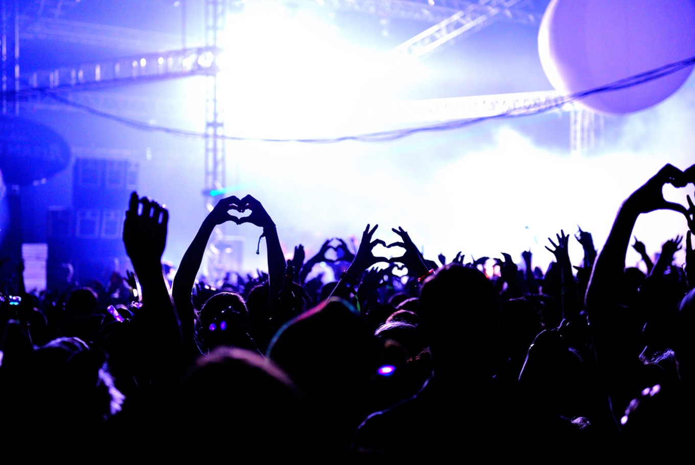 Illustration of attendees at a concert.