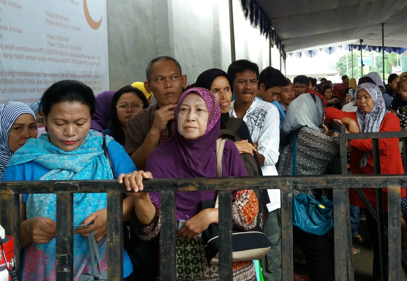 Hundreds of people are queuing to meet their incarcerated relatives at Cipinang prison in East Jakarta.
