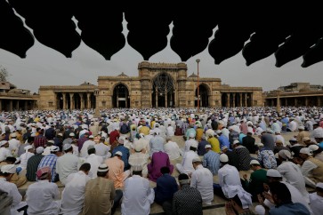 Muslims celebrate Eid, marking Ramadan's end