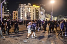 A man that was protesting against the coup, wounded when Turkish forces soldiers opened fire to disperse the crowd is carried away in Istanbul's Taksim square, early Saturday, July 16, 2016. Members of Turkey's armed forces said they had taken control of the country, but Turkish officials said the coup attempt had been repelled early Saturday morning in a night of violence , according to state-run media. AP Photo/Selcuk Samiloglu