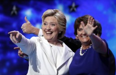 Democratic presidential nominee Hillary Clinton is joined by Anne Holton, wife of Democratic vice presidential candidate, Sen. Tim Kaine, D-Va., during the final day of the Democratic National Convention in Philadelphia, Thursday, July 28, 2016. AP Photo/Carolyn Kaster
