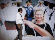A worker checks on the lighting on the stage at Wells Fargo Arena before the start of the final day of the Democratic National Convention in Philadelphia, Thursday, July 28, 2016. AP Photo/Mary Altaffer