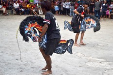  Jaranan performers dance to the music in a trance. Jaran is horse in Javanese. JP/Aman Rochman