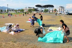 Visitors claim places to watch fireworks displays for free during a festival. JP/Tarko Sudiarno