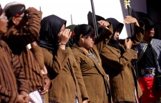 Women and girls participate in the ceremony 2016.JP/Aditya Sagita