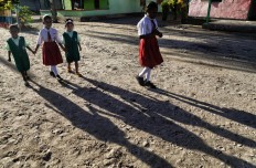 Children go to school on Namatota Island. JP/Wendra Ajistyatama
