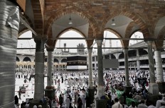 Muslim pilgrims arrive to circle the Kaaba, Islam's holiest shrine, at the Grand Mosque in the Muslim holy city of Mecca, Saudi Arabia, Thursday, Sept. 8, 2016. Muslim pilgrims have begun arriving at the holiest sites in Islam ahead of the annual hajj pilgrimage in Saudi Arabia, with some weeping with their hands outstretched for a fleeting touch of the Kaaba. The cube-shaped shrine, at the center of Mecca's Grand Mosque, is the site the world’s 1.6 billion Muslims pray toward five times a day. AP Photo/Nariman El-Mofty