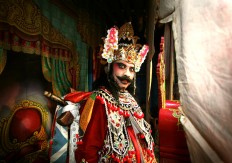 A male dancer donning a costume is ready to dance. JP/ Aman Rochman