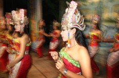 The dancers include Errin [center], a 17-year-old who performs to help fund her education. JP/ Aman Rochman