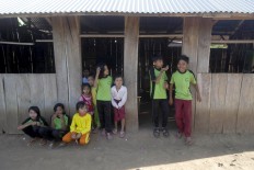 Students gather outside the two classrooms before school starts. JP/ Sigit Pamungkas