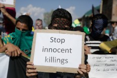 Kashmiri protesters shout pro freedom slogans during a protest in Srinagar, Indian controlled Kashmir, Sunday, Sept. 25, 2016. Kashmir is witnessing the largest protests against Indian rule in recent years, sparked by the July 8 killing of a popular rebel commander by Indian soldiers. AP Photo/Mukhtar Khan