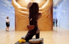 A woman looks towards part of an artwork called 'Lichen! Libido! [London!] Chastity!' by Anthea Hamilton, one of the four artists shortlisted for the Turner Prize 2016, as it is displayed at the Tate Britain gallery in London, Monday, Sept. 26, 2016. The Turner Prize aims to promote public debate around new developments in contemporary British art. AP Photo/Kirsty Wigglesworth