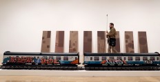 A man films part of an artwork by Josephine Pryde, one of the four artists shortlisted for the Turner Prize 2016, as it is displayed at the Tate Britain gallery in London, Monday, Sept. 26, 2016. The Turner Prize aims to promote public debate around new developments in contemporary British art. AP Photo/Kirsty Wigglesworth
