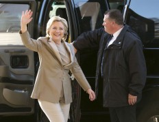 Democratic presidential candidate Hillary Clinton waves as she arrives to vote at her polling place in Chappaqua, N.Y., Tuesday, Nov. 8, 2016. AP Photo/Seth Wenig