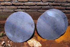 The circular plates will be made into a bonang, a medium-sized metal percussion set. JP/Aditya Sagita