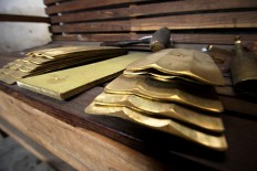 Bars of saron and gambang lay on a table in the Daliyono Legiono workshop. JP/Aditya Sagita