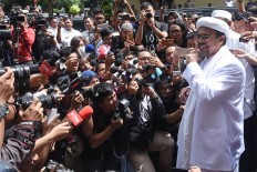 Jokowi rejects Islamists&rsquo; plea to drop porn case against Rizieq