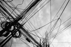 Complicated: Tangled cables are seen on Jl Samanhudi in Central Jakarta. JP/ Dhoni Setiawan