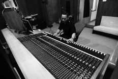 A staff member operates an audio mixer in one of the recording rooms at Lokananta. JP/Ganug Nugroho Adi