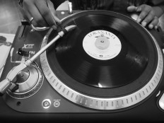 A worker undertakes the process of digitalizing a vinyl record to save the master recording. JP/Ganug Nugroho Adi