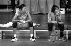 Petro Kimia Gresik substitute players wait on the bench during a match at Ken Arok Indoor Stadium in Malang, East Java, on March 18. JP/Aman Rochman