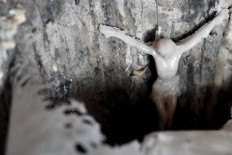 A Corpus Christi cross is made of resin. JP/Magnus Koeshendratmo