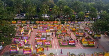 City Hall decorated with wreaths thanking Ahok