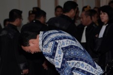 Incumbent Jakarta Governor Basuki "Ahok" Tjahaja Purnama prepares to hear the verdict against him at the North Jakarta District Court on Tuesday. JP/Sigid Kurniawan/Pool