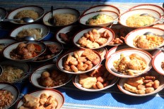 Various foods are available during the Nyadran ceremony (a tradition for Javanese Muslims in Central Java that combines culture with religion ahead of Ramadhan) at Pucung village, Banyumanik district, Semarang on May 12. JP/Suherdjoko