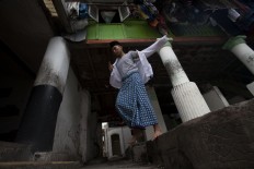 A student walks to the mosque. JP/Sigit Pamungkas