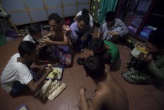 Students share food and drinks when breaking the fast. JP/Sigit Pamungkas