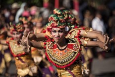 Balinese artists perform during the opening of the 39th Bali Art Festival at the Bajra Sandhi Monument in Denpasar. JP/Agung Parameswara