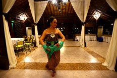 Beauty and strength: Henny Elvandari,59, a Rantaya dancer, poses for a photoshoot after the performance. Henny is the oldest dancer in Purwakanthi. JP/ Wienda Parwitasari