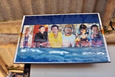 A photograph of the makers of Timang’s wooden cable car is hung on the wall. JP/Magnus Hendratmo