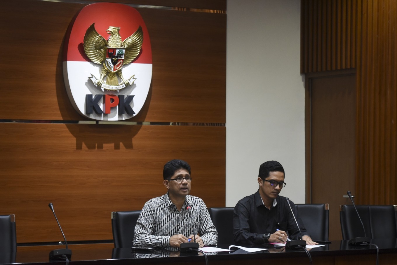 Against corruption: Corruption Eradication Commission (KPK) deputy chairman Laode Muhammad Syarif ('left') and the anti-graft body's spokesperson Febri Diansyah give a press statement at the KPK headquarters in Jakarta on Aug.2.  