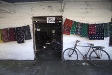 Work Station: A typical Parengan fabrics shop in Lamongan, east Java. JP/ Sigit Pamungkas