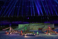 Dancers on board boats perform during the SEA Games opening ceremony. JP/Seto Wardhana