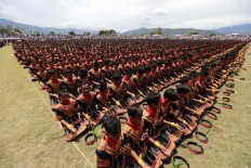 A total of 12,262 dancers perform the Saman dance at Blangkejeren stadium. JP/Hotli Simanjuntak
