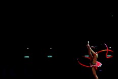 Strike a pose: Gymnast Nabila Evandestiera performs during the 29th SEA Games rhythmic gymnastics women's all-around finals. Indonesia's gymnastic team had won one gold medal, two silvers and six bronze medals as of Monday. JP/Seto Wardhana
