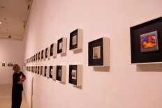 A visitor looks at rows of light switches, each measuring only 5 by 7 centimeters, which were painted by 208 national and international artists, including renowned local talents Joko Pekik and Heri Dono. JP/Tarko Sudiarno