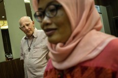 Devotion: Father Lambertus H Hagendoorn OFM, 75, remains active in Yayasan Peduli AIDS (YAPEDA), a foundation in Timika engaged in HIV/AIDS prevention, care and treatment. JP/Albertus Vembrianto
