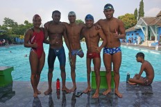 Red-and- White swimming athletes pose for a team photo after their training session for the
2017 ASEAN Para Games. JP/Maksum Nur Fauzan